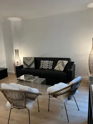 Coin salon dans l'établissement NOTRE DAME - STYLISH APARTMENT