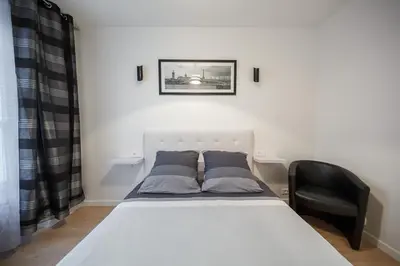 Un ou plusieurs lits dans un hébergement de l'établissement NEAR EIFFEL TOWER - BEAUTiFUL FLAT
