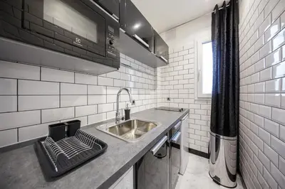 Cuisine ou kitchenette dans l'établissement NEAR EIFFEL TOWER - BEAUTiFUL FLAT