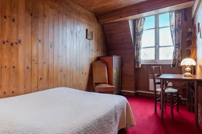 Un ou plusieurs lits dans un hébergement de l'établissement Hotel Esmeralda