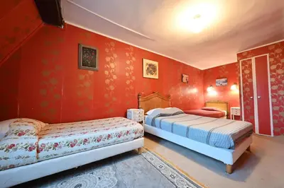 Un ou plusieurs lits dans un hébergement de l'établissement Hotel Esmeralda
