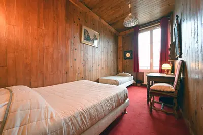 Un ou plusieurs lits dans un hébergement de l'établissement Hotel Esmeralda