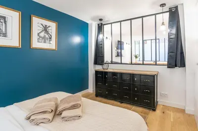 Un ou plusieurs lits dans un hébergement de l'établissement Prestigious House - 3 rooms - Montparnasse & St Germain