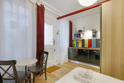 Un ou plusieurs lits dans un hébergement de l'établissement A Sweet Studio in Montparnasse - Boulevard du Montparnasse