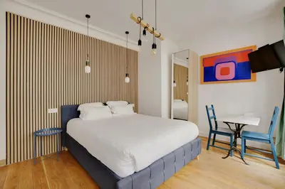 Un ou plusieurs lits dans un hébergement de l'établissement A Sweet Studio in Montparnasse - Boulevard du Montparnasse