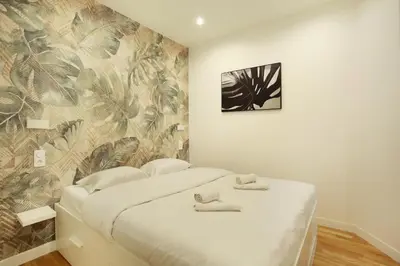 Un ou plusieurs lits dans un hébergement de l'établissement Rent a Room - Tracy apartment