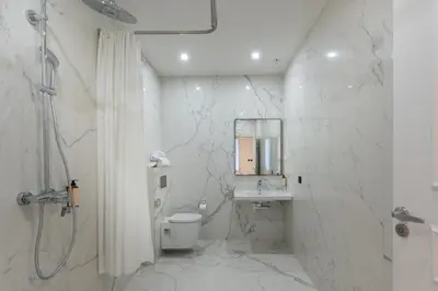Salle de bains dans l'établissement HOTEL AU COEUR DE REPUBLIQUE
