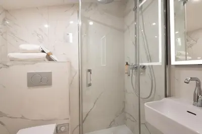 Salle de bains dans l'établissement HOTEL AU COEUR DE REPUBLIQUE