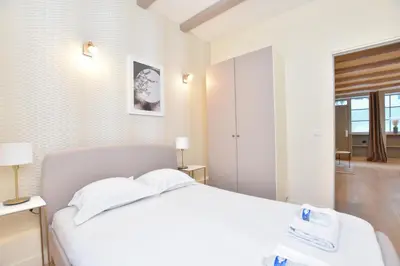 Un ou plusieurs lits dans un hébergement de l'établissement Cosy apartment - Buttes aux Cailles
