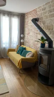 Coin salon dans l'établissement Appartement calme au coeur de Montmartre !