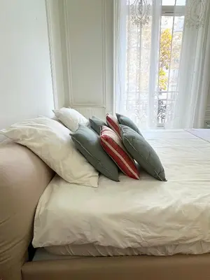 Un ou plusieurs lits dans un hébergement de l'établissement l'appartement Malesherbes