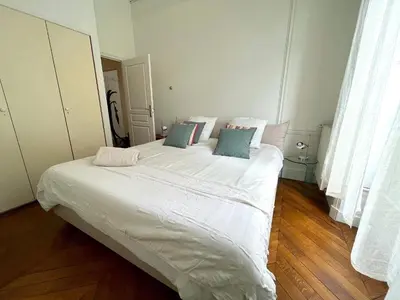 Un ou plusieurs lits dans un hébergement de l'établissement l'appartement Malesherbes