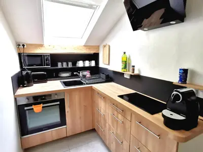 Cuisine ou kitchenette dans l'établissement Bagneux Paris Confort Netflix RER B