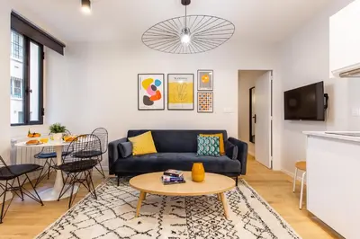 Coin salon dans l'établissement Charming apartment - 2BR-6P - Grands Boulevards