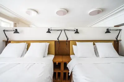 Un ou plusieurs lits dans un hébergement de l'établissement Pied A Terre Palestro