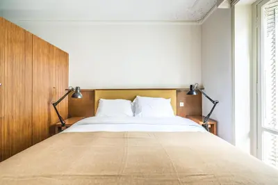 Un ou plusieurs lits dans un hébergement de l'établissement Pied A Terre Palestro