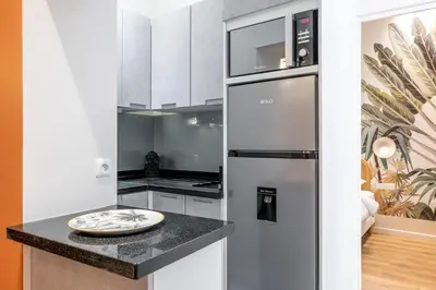Cuisine ou kitchenette dans l'établissement HolidaysInParis - Bonne Nouvelle