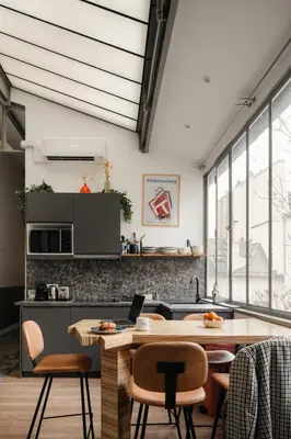 Cuisine ou kitchenette dans l'établissement Edgar Suites Martyrs - Loft