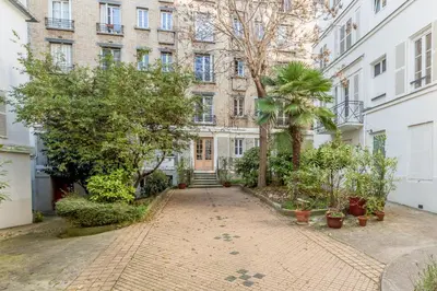 Jardin de l'établissement Edgar Suites Martyrs - Loft