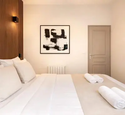 Un ou plusieurs lits dans un hébergement de l'établissement Louvre - Premium apartment for 4