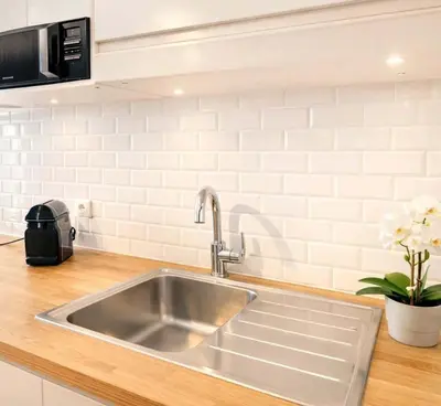 Cuisine ou kitchenette dans l'établissement Louvre - Premium apartment for 4