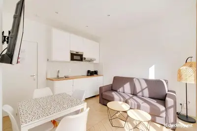 Cuisine ou kitchenette dans l'établissement Résidence 1BDR Bastille