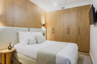 Un ou plusieurs lits dans un hébergement de l'établissement Welcoming Apartment - 2BR-6P - Bastille