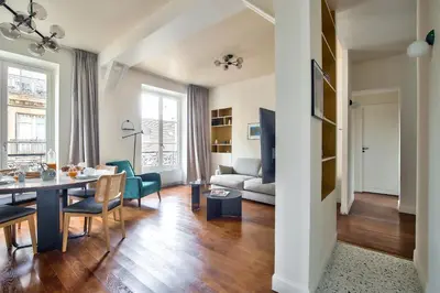 Coin salon dans l'établissement The Perfect Parisian Flat Bd St-Germain - Mid Term