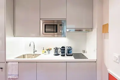 Cuisine ou kitchenette dans l'établissement Citihome Paris