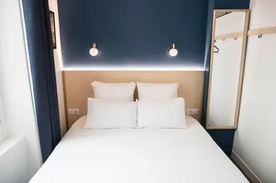 Un ou plusieurs lits dans un hébergement de l'établissement MAISON FRANCOIS Paris - Loft Edith