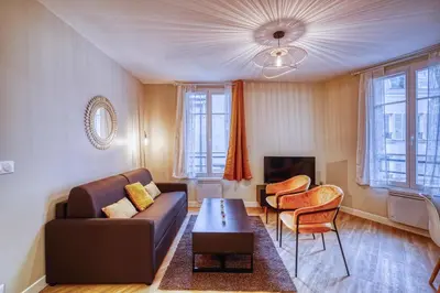 Coin salon dans l'établissement Manarola, F3 à deux pas de Montparnasse