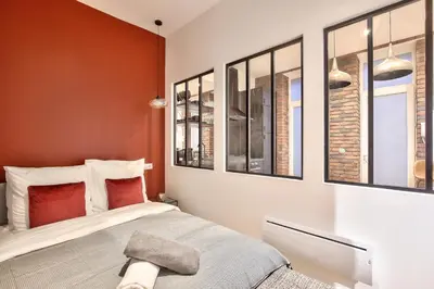 Un ou plusieurs lits dans un hébergement de l'établissement NEW ! Charming 1BR Apt in Paris 15