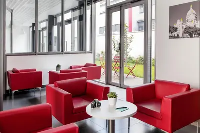 Coin salon dans l'établissement Aparthotel Adagio Access Paris Clichy