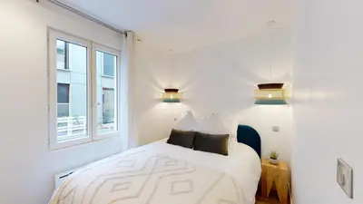 Un ou plusieurs lits dans un hébergement de l'établissement Superb and Cosy 2BR Apt In The Heart Of Paris ! 3P