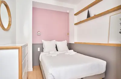 Un ou plusieurs lits dans un hébergement de l'établissement GuestReady - Modern flat near Latin Quarter!