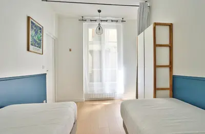 Un ou plusieurs lits dans un hébergement de l'établissement GuestReady - Modern flat near Latin Quarter!