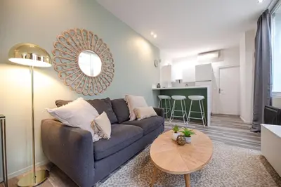 Coin salon dans l'établissement Lovely Home in Paris Center - AC