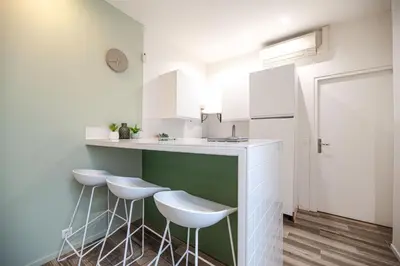 Cuisine ou kitchenette dans l'établissement Lovely Home in Paris Center - AC