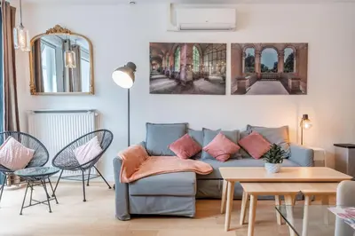 Coin salon dans l'établissement Appartement spacieux et rénové
