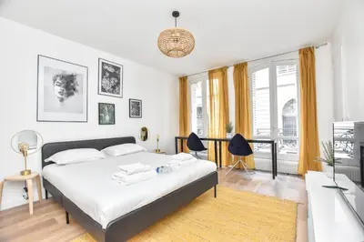 Un ou plusieurs lits dans un hébergement de l'établissement Superb apartment - 6P- Center of Paris