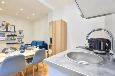 Cuisine ou kitchenette dans l'établissement Welcoming apartment - 1BR-4P -Grands Boulevards