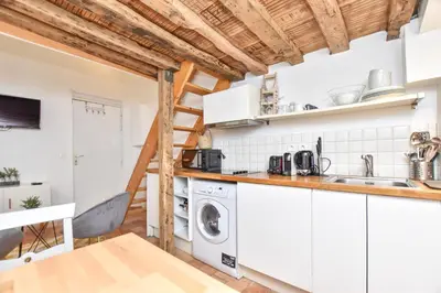 Cuisine ou kitchenette dans l'établissement Splendid duplex - 1BR-2P - Notre Dame-Île St-Louis