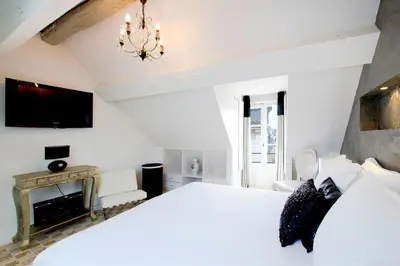 Un ou plusieurs lits dans un hébergement de l'établissement Habitat Parisien - Marais Sicile