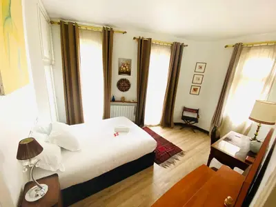 Un ou plusieurs lits dans un hébergement de l'établissement Romantic Apartment in Paris