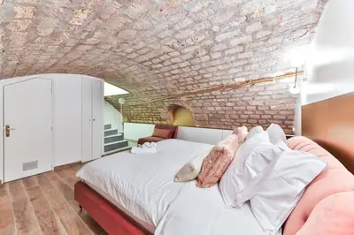 Un ou plusieurs lits dans un hébergement de l'établissement New&Renovated in heart of PARIS- 6pers
