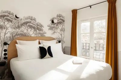 Un ou plusieurs lits dans un hébergement de l'établissement My Maison In Paris Montmartre