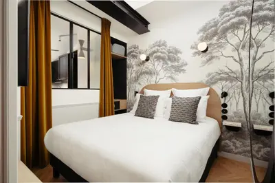 Un ou plusieurs lits dans un hébergement de l'établissement My Maison In Paris Montmartre