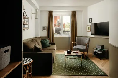 Télévision ou salle de divertissement dans l'établissement My Maison In Paris Montmartre