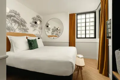 Un ou plusieurs lits dans un hébergement de l'établissement My Maison In Paris Montmartre