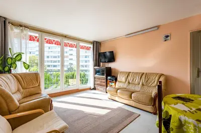 Coin salon dans l'établissement Double bedroom with shared kitchen & bathroom, Paris